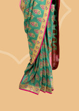 Teal Green Tussar Georgette Saree with Light Pink Motifs