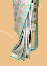 Grey & Firozi Floral Tussar Georgette Saree
