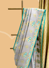 Grey & Firozi Floral Tussar Georgette Saree