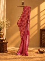 A red and zari stipe saree in chanderi georgette with a delicate zari border