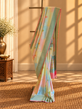A beautiful muga georgette rangkat in pastel colours of lemon pista sky blue and baby pink handpainted with zari jaal and floral bootis