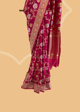 Made from luxurious silk and featuring the intricate traditional jangla ektaara weave in muted gold and silver zari. Shop the best collection of authentic, handwoven, pure benarasi sarees with Roliana New Delhi