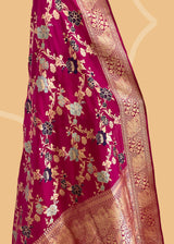 An heirloom-worthy saree, this Rani pink ektara kadhwa is crafted from the finest pure silk Benarasi. Woven by Roliana artisans with a meenakari jaal, its vibrant hue and delicate handwork make it a timelessly elegant piece.