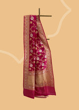 Made from luxurious silk and featuring the intricate traditional jangla ektaara weave in muted gold and silver zari. Shop the best collection of authentic, handwoven, pure benarasi sarees with Roliana New Delhi