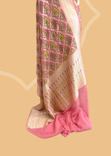 Pink meenakari pure georgette benarasi saree by Roliana. Shop the best collection of authentic, handwoven, pure benarasi sarees with Roliana New Delhi