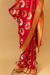 Red pure benarasi georgette handwoven saree with chaand bootis in silver and gold zari all over by Roliana Weaves. Pure Banarasi Saree.