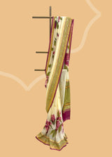 ivory cream saree in Georgette with zari bootis and border and hand painted irises in wine colour all over the saree.. A pure Banarasi wedding Sari Shop the best collection of authentic, handwoven, pure benarasi sarees with Roliana New Delhi