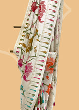 A silver tissue Georgette paithani all over woven saree in multicoloured weave . pure Banarasi Sari Shop the best collection of authentic, handwoven, pure benarasi sarees with Roliana New Delhi