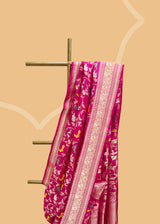 Rani pink gajji saree with shikargah meenakari weave and a gold inlay shikargah motif border and pallu Shop the best collection of authentic, handwoven, pure benarasi sarees with Roliana New Delhi