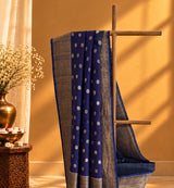 Tussar georgette dollar booti saree shaded in indigo and gray colour and a zari border and pallu