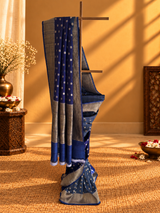 Tussar georgette dollar booti saree shaded in indigo and gray colour and a zari border and pallu
