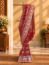 Silk ektaara jaal saree in a one of a kind kahwa jaal with meenakari detailing and an ornamental border and pallu