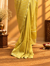 A yellow and zari stipe saree in chanderi georgette with a delicate zari border