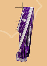 This exquisite Purple Mashru Silk Pure Zari Benarasi Saree is handwoven in satin silk by Roliana. Shop the best collection of authentic, handwoven, pure benarasi sarees with Roliana New Delhi