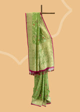  The lime green floral jaal benarasi saree is adorned with pretty pink detailed flowers, with the vibrant wine coloured kanni is perfect for summer wedddings. Shop the best collection of authentic, handwoven, pure benarasi sarees with Roliana New Delhi