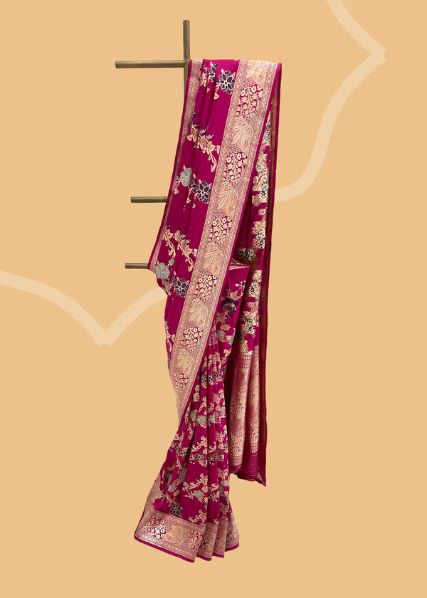 An heirloom-worthy saree, this Rani pink ektara kadhwa is crafted from the finest pure silk Benarasi. Woven by Roliana artisans with a meenakari jaal, its vibrant hue and delicate handwork make it a timelessly elegant piece.