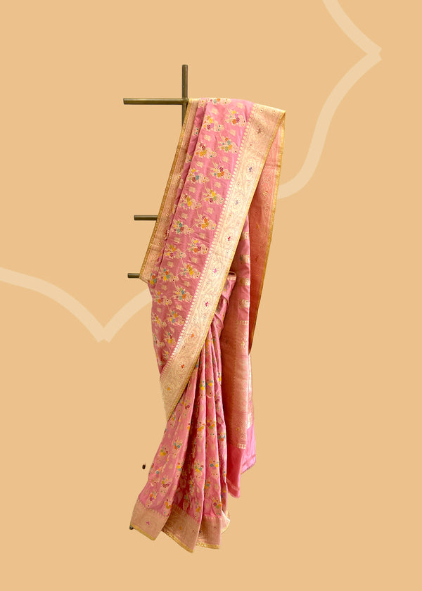 A powder pink French renaissance jaal work in meenakari, this saree is timeless and heirloom worthy. Shop the best collection of authentic, handwoven, pure benarasi sarees with Roliana New Delhi