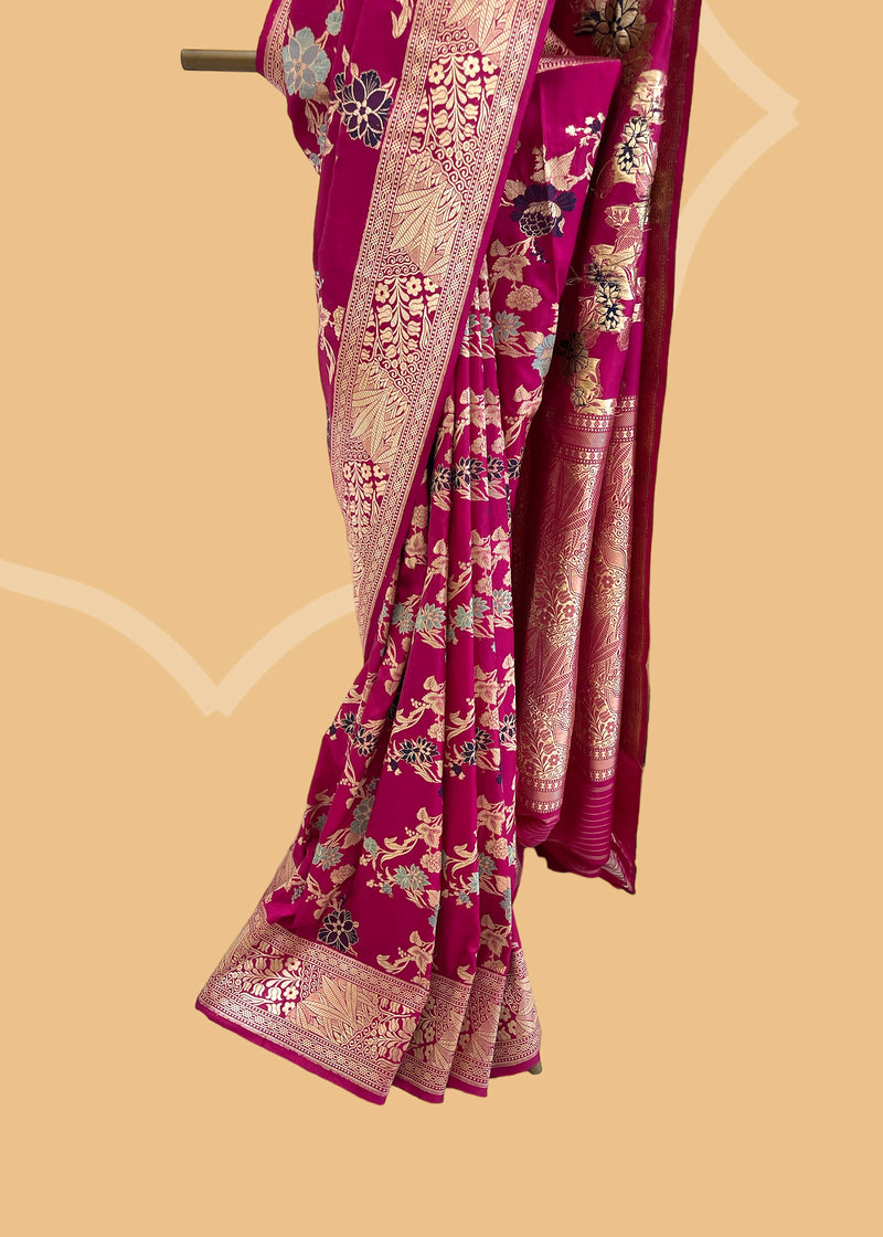 An heirloom-worthy saree, this Rani pink ektara kadhwa is crafted from the finest pure silk Benarasi. Woven by Roliana artisans with a meenakari jaal, its vibrant hue and delicate handwork make it a timelessly elegant piece.