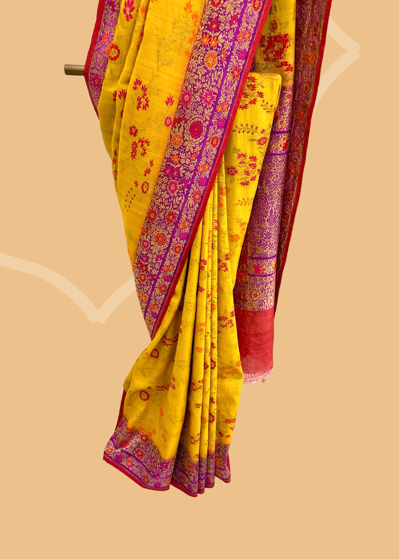 Bright yellow tussar georgette saree