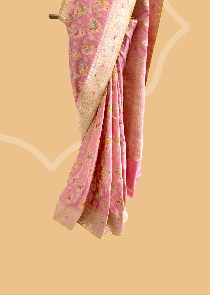 A powder pink French renaissance jaal work in meenakari, this saree is timeless and heirloom worthy. Shop the best collection of authentic, handwoven, pure benarasi sarees with Roliana New Delhi
