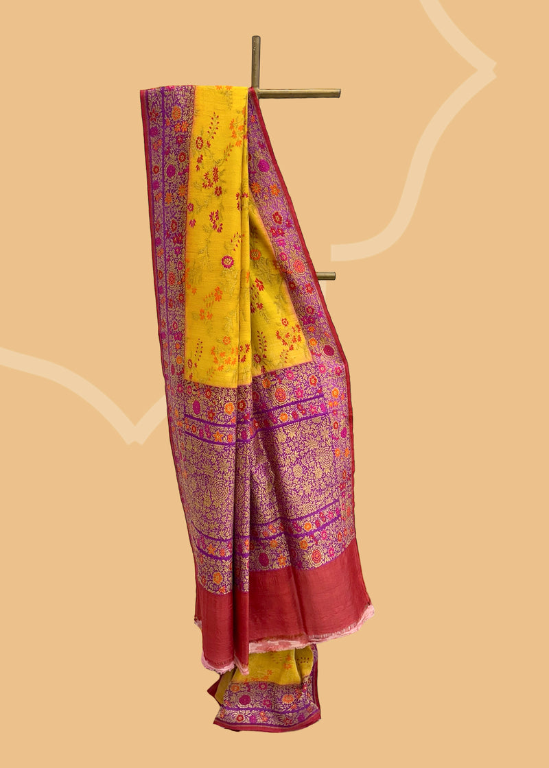 Bright yellow tussar georgette saree