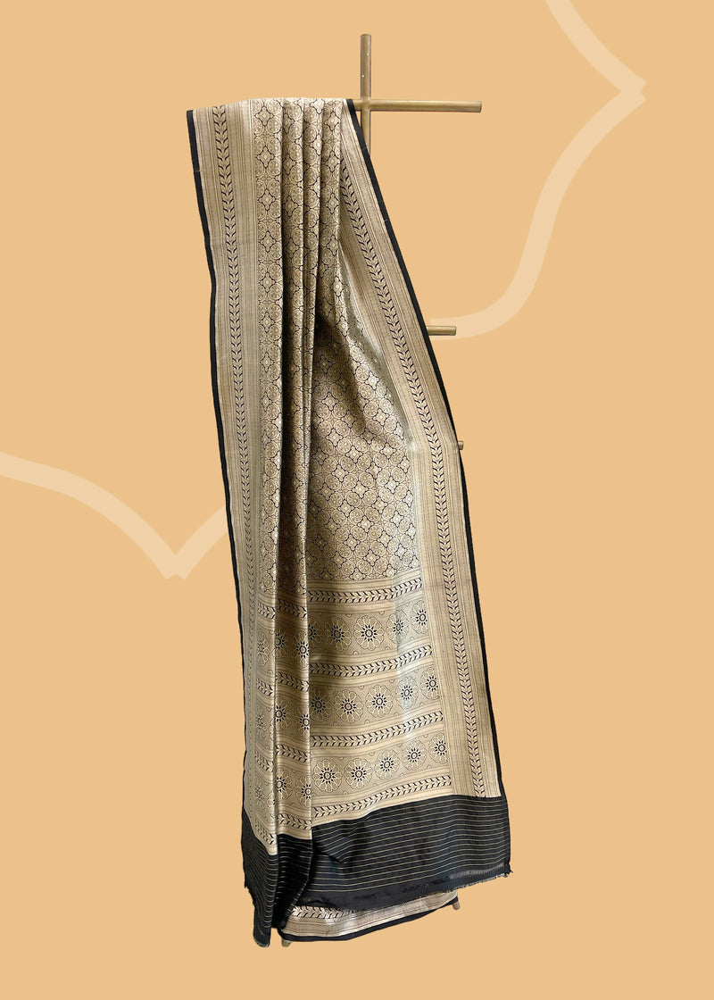 A beautiful silk brocade saree with all over naqshi jaal and an interesting lace border and pallu. Shop the best collection of authentic, handwoven, pure benarasi sarees with Roliana New Delhi