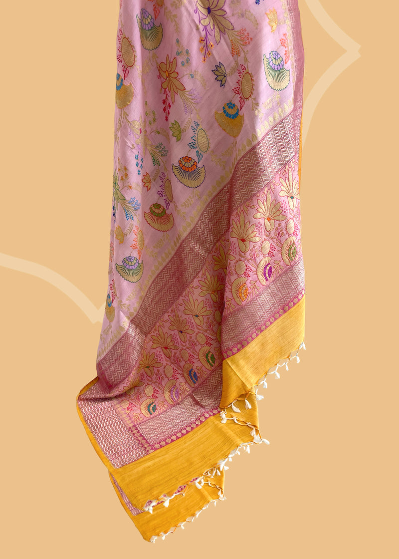 A light pink meenakari kinkhab saree with wine colour border and a contrast yellow kanni and blouse. Shop the best collection of authentic, handwoven, pure benarasi sarees with Roliana New Delhi