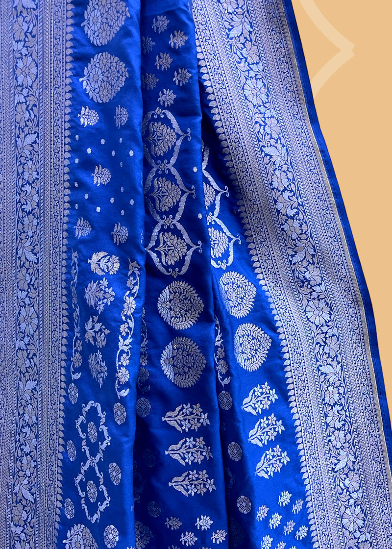 A royal blue ektaara weave with silver and gold zari saree. Shop the best collection of authentic, handwoven, pure benarasi sarees with Roliana New Delhi