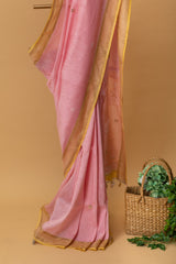 Pink pure linen saree with Chikankari bootis and pita kaamdani work by Roliana Weaves. SHop handwoven summer sarees by Roliana Banaras. Ekaya Tifli