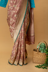 Pink katan silk handwoven saree with ektaara oriental jaal from our revival weaves series by Roliana Weaves. Shop exclusive heritage weaves sarees at Roliana Banaras online store.