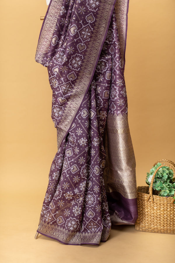 Purple pure handwoven benarasi tussar silk saree with all over Patola weave in white and silver combination by Roliana Weaves. Best banarasi sari online