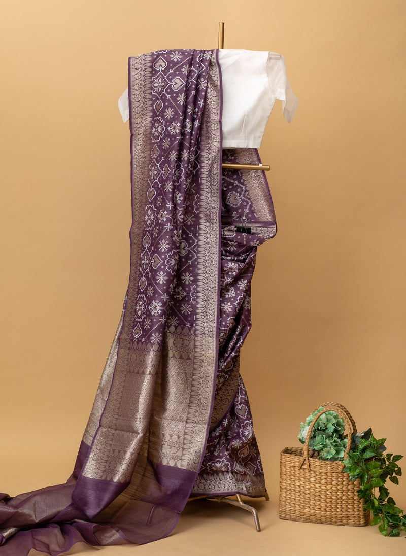 Purple pure handwoven benarasi tussar silk saree with all over Patola weave in white and silver combination by Roliana Weaves. Best banarasi sari online