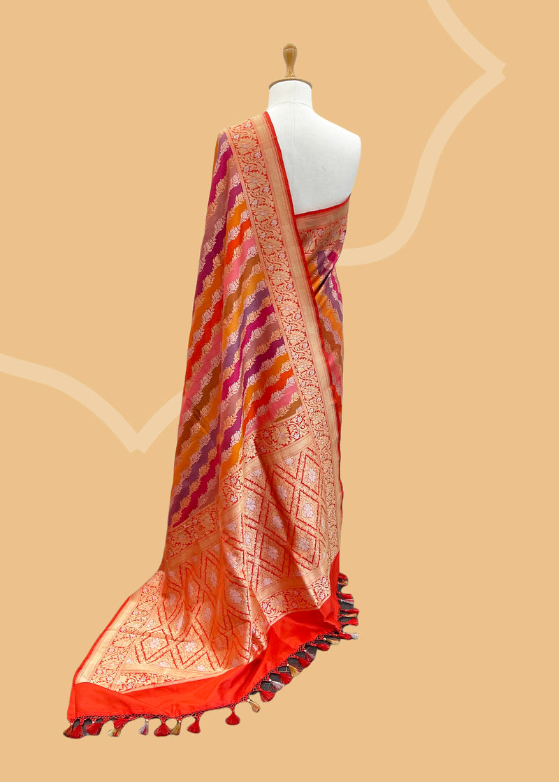 Jewel tone multicolour rangkaat weave pure banarasi silk saree. Shop the best collection of authentic, handwoven, pure benarasi sarees with Roliana New Delhi