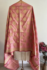 coral coloured silk dupatta with circular floral motifs woven all over, and a traditional benarasi border, by Roliana