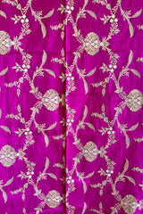 A beautiful wine silk dupatta with traditional benarasi floral jaal woven all over in gold zari, by Roliana Weaves.