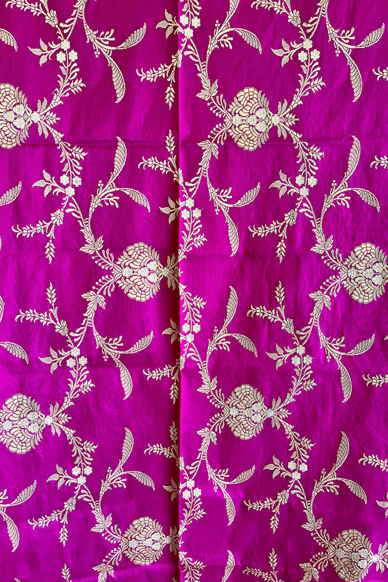 A beautiful wine silk dupatta with traditional benarasi floral jaal woven all over in gold zari, by Roliana Weaves.