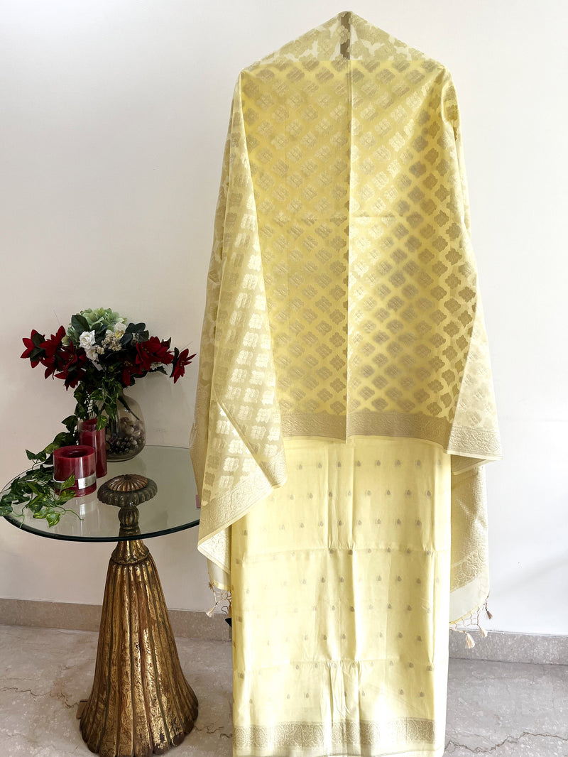 Yellow Chanderi suit sets with woven bootis on kurta and dupatta by Roliana Weaves Benaras