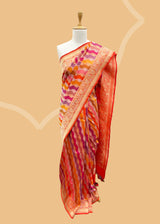 Jewel tone multicolour rangkaat weave pure banarasi silk saree. Shop the best collection of authentic, handwoven, pure benarasi sarees with Roliana New Delhi