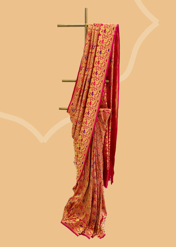 Red kadhwa jaal brocade saree with traditional iktaara jaal and meenakari anaar bootis all over. Shop the best collection of authentic, handwoven, pure benarasi sarees with Roliana New Delhi
