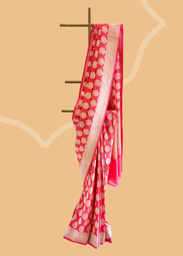 A peach pink upada zari booti saree in silk. Shop the best collection of authentic, handwoven, pure benarasi sarees with Roliana New Delhi