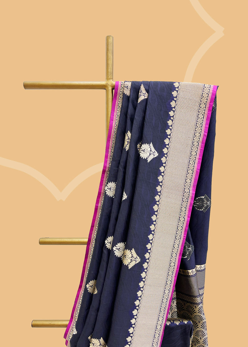 A midnight blue silk tanchoi saree with gold silver woven bootis and border and a beautiful contrast jamuni kanni Shop the best collection of authentic, handwoven, pure benarasi sarees with Roliana New Delhi