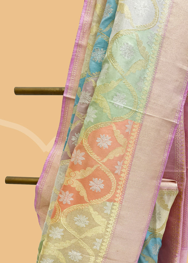 Pure zari rangkat kangoora jaal in silk and tissue weave made in pastel shades of silver peach pista lilac and firozi. A true masterpiece Shop the best collection of authentic, handwoven, pure benarasi sarees with Roliana New Delhi