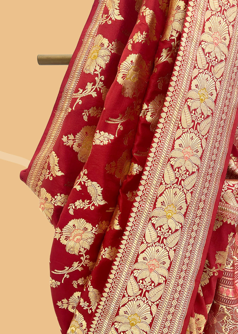 A blush of red jangla weave saree in ektaara silk with delicate meenakari work in a soft drapy silk pure Banarasi Sari Shop the best collection of authentic, handwoven, pure benarasi sarees with Roliana New Delhi