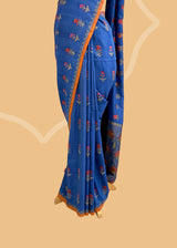 A royal blue tussar Georgette Neel saree with woven meenakari weave. A pure Banarasi Sari Shop the best collection of authentic, handwoven, pure benarasi sarees with Roliana New Delhi