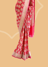 A peach pink upada zari booti saree in silk. Shop the best collection of authentic, handwoven, pure benarasi sarees with Roliana New Delhi