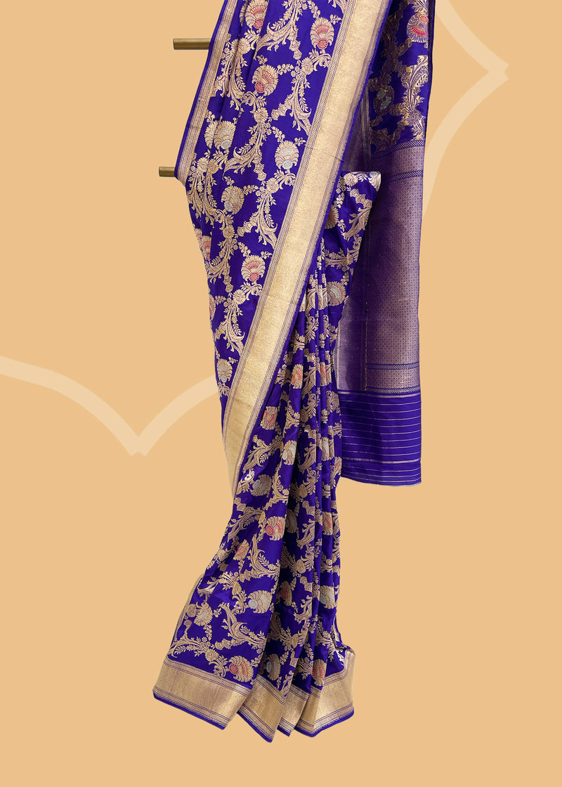 A baigani Noor jangla saree with meenakari jaal and motifs in very soft silk Shop the best collection of authentic, handwoven, pure benarasi sarees with Roliana New Delhi