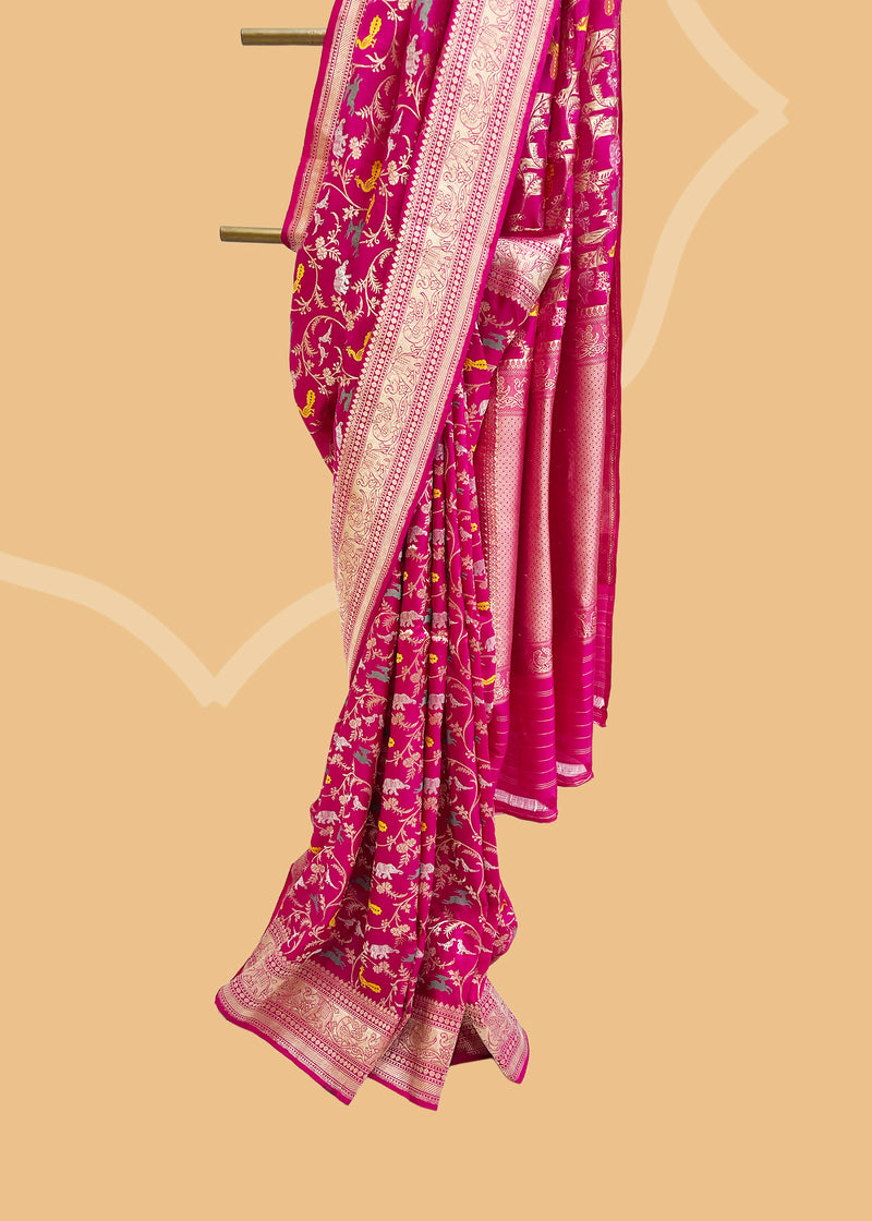 Rani pink gajji saree with shikargah meenakari weave and a gold inlay shikargah motif border and pallu Shop the best collection of authentic, handwoven, pure benarasi sarees with Roliana New Delhi