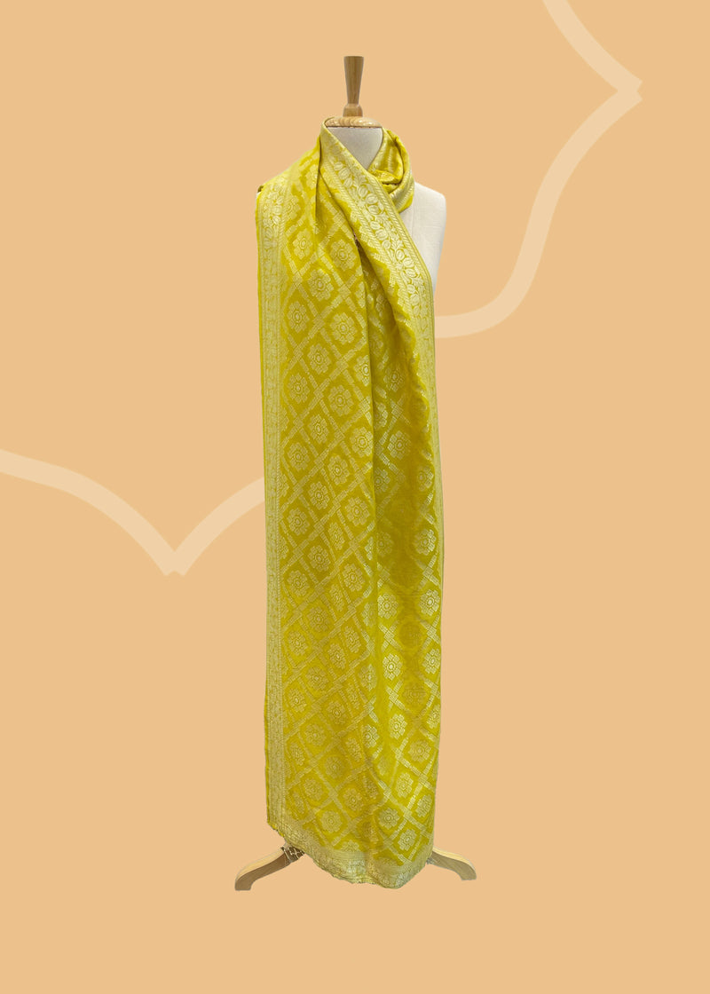 Yellow pure benarasi dupatta and stole. Shop the best of Banarasi sarees, dupattas and lehengas at Roliana New Delhi