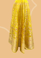 Yellow pure silk banarasi lehenga with meenakari by Roliana Weaves. Shop the best of Pure Benarasi sarees and lehengas at Roliana New Delhi. 