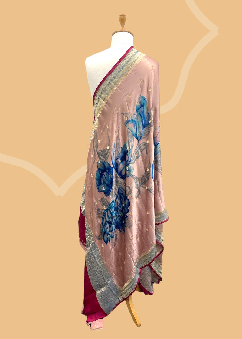 Pure silk benarasi dupatta in lavender with handpainted flowers by Roliana Weaves. Shop the best of Banarasi sarees, dupattas and lehengas at Roliana New Delhi